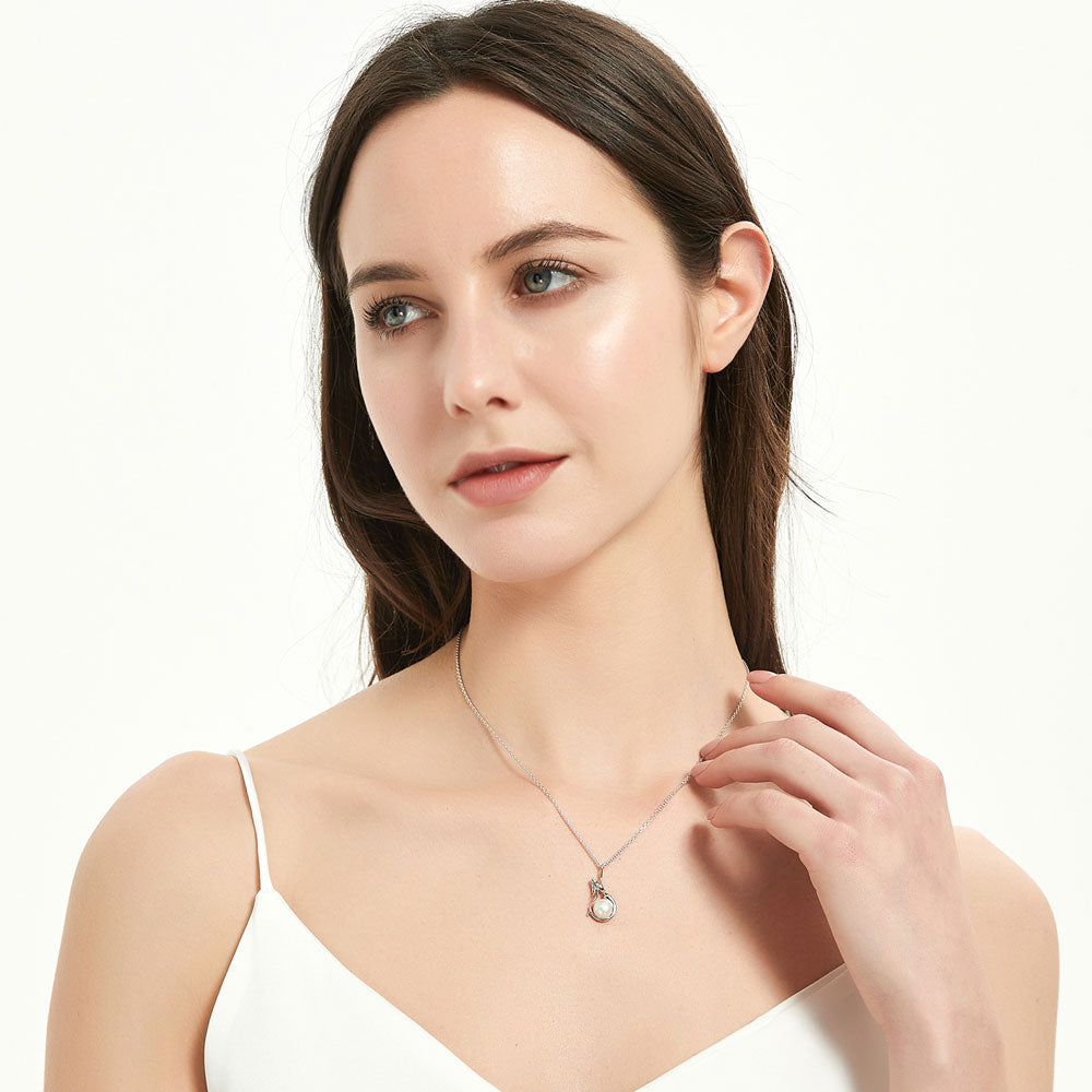 Model wearing Mermaid White Button Cultured Pearl Necklace in Sterling Silver