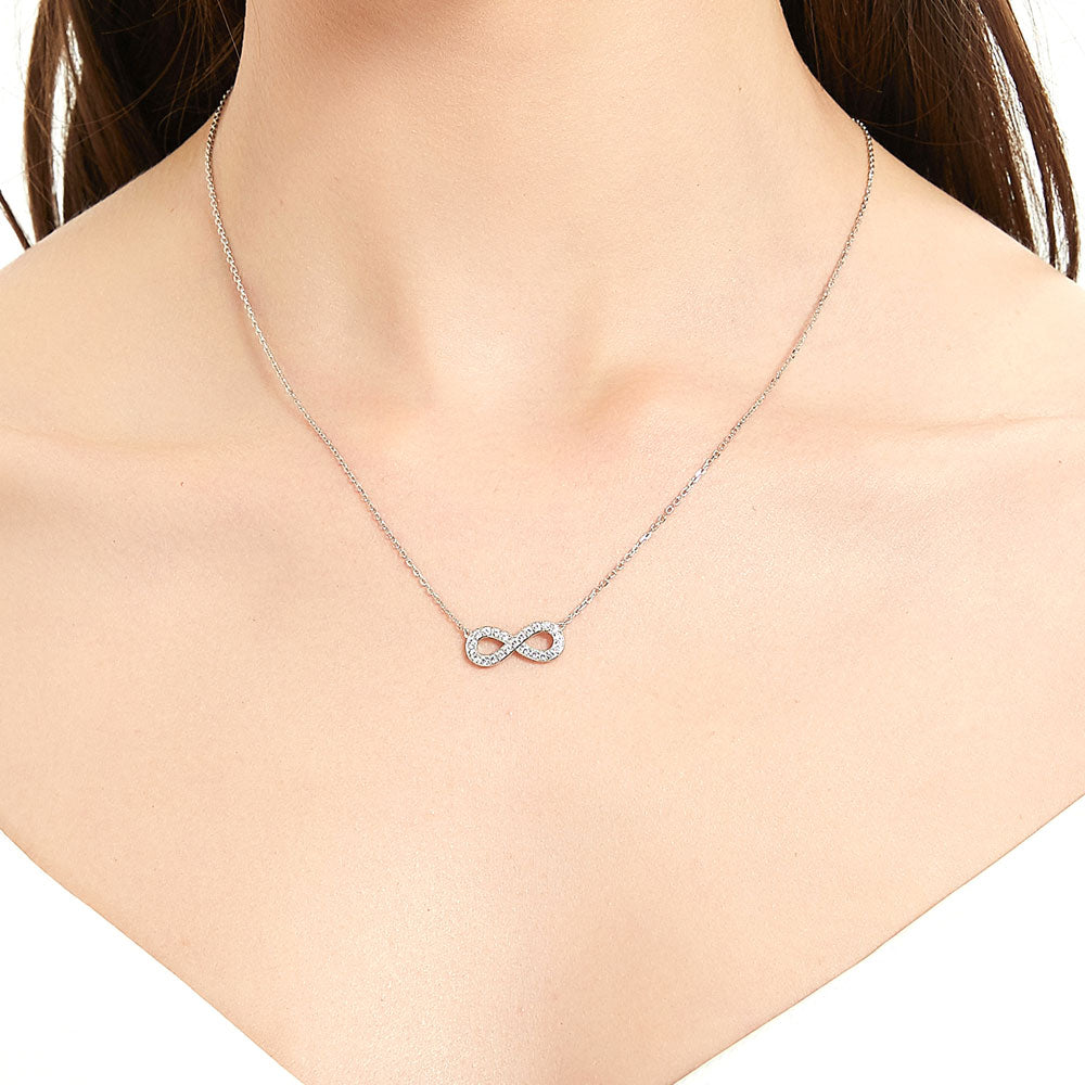 Model wearing Infinity CZ Pendant Necklace in Sterling Silver, 2 of 6