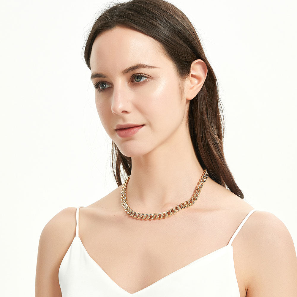 Model wearing Statement Bracelet and Necklace Set in Gold-Tone, 2 Piece