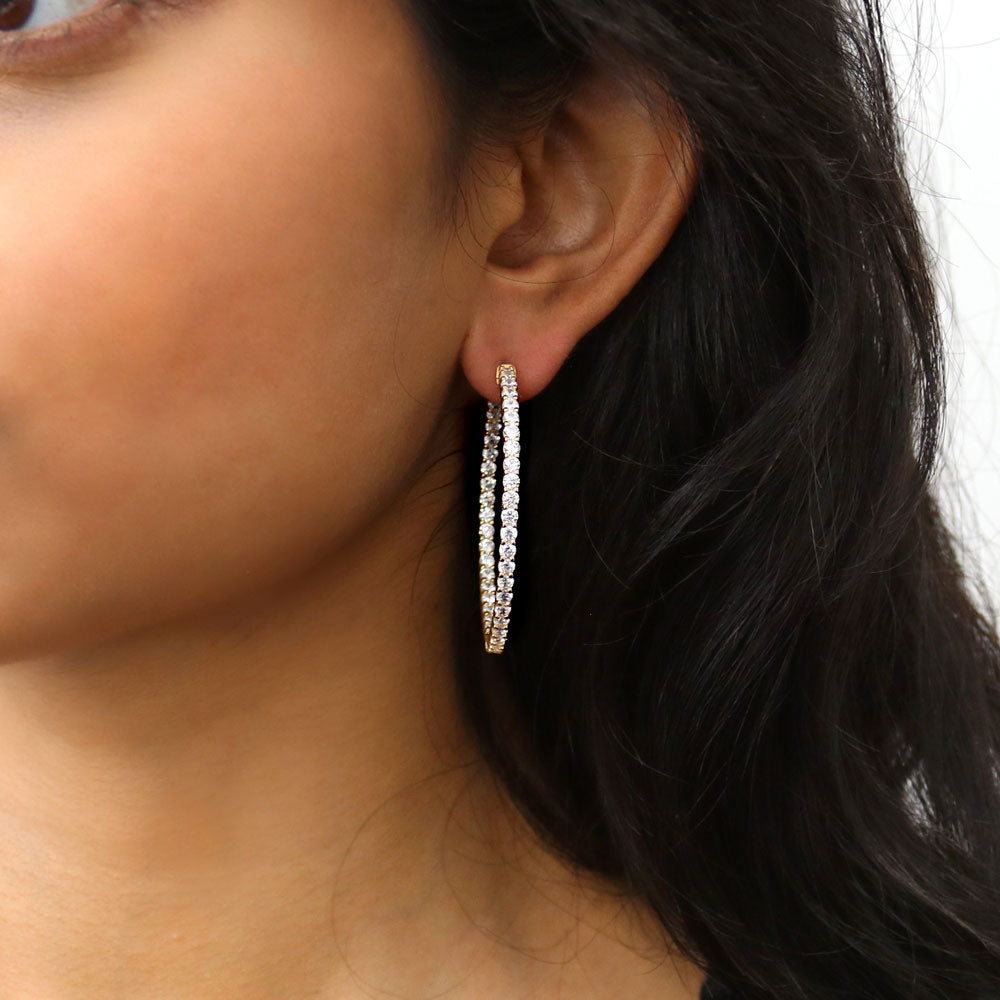 Model wearing CZ Large Inside-Out Hoop Earrings in Sterling Silver 1.8 inch