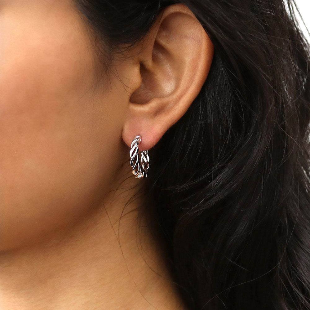 Model wearing Woven Small Hoop Earrings in Sterling Silver 0.7 inch, Yellow Gold Flashed