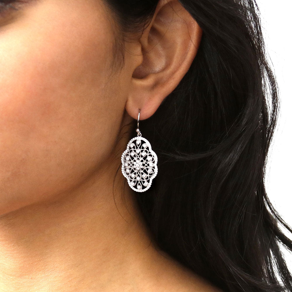 Model wearing Flower Milgrain CZ Statement Fish Hook Earrings in Sterling Silver