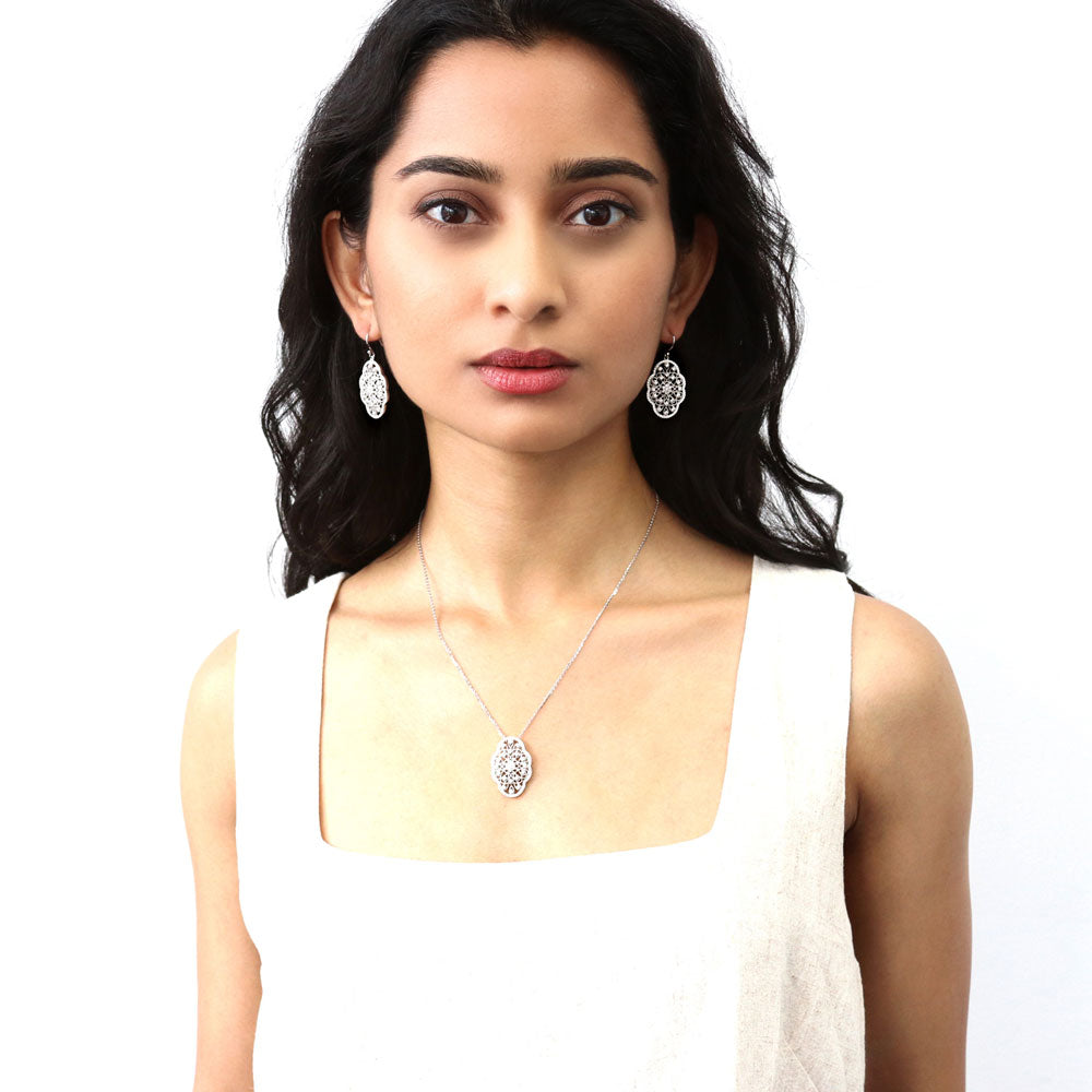 Model wearing Flower Milgrain CZ Statement Fish Hook Earrings in Sterling Silver