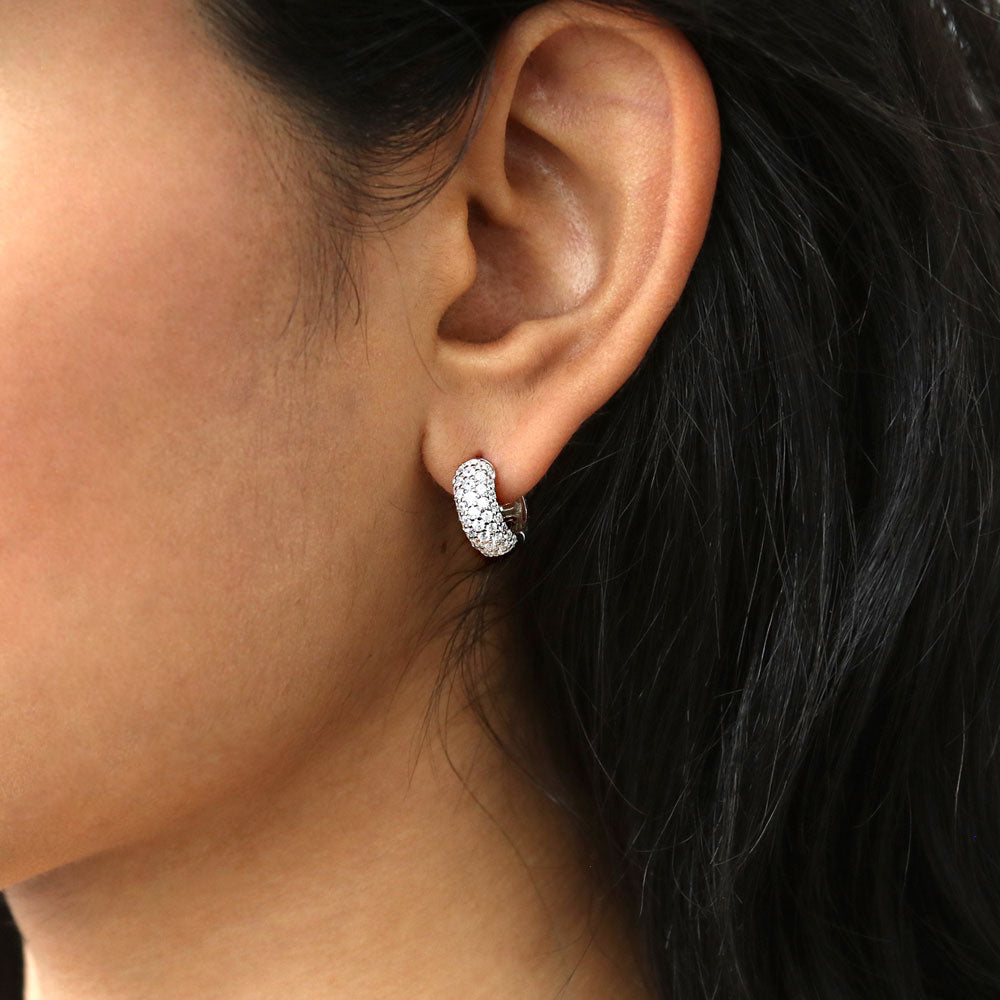 Model wearing Dome CZ Small Huggie Earrings in Sterling Silver 0.5 inch