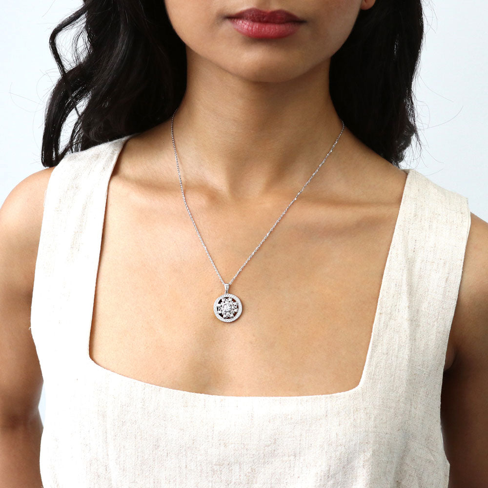 Model wearing Flower Medallion CZ Pendant Necklace in Sterling Silver