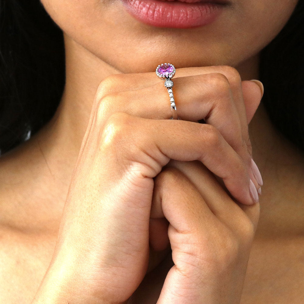 Model wearing 3-Stone Purple Oval CZ Ring in Sterling Silver