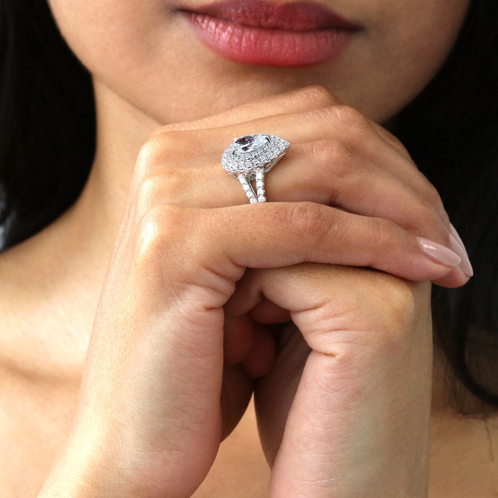 Model wearing Halo Pear CZ Statement Split Shank Ring in Sterling Silver