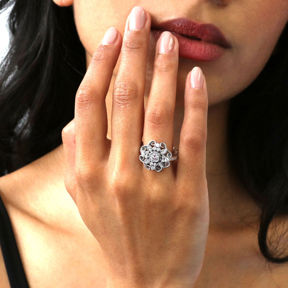 Model wearing Halo Flower Round CZ Ring in Sterling Silver, 3 of 9