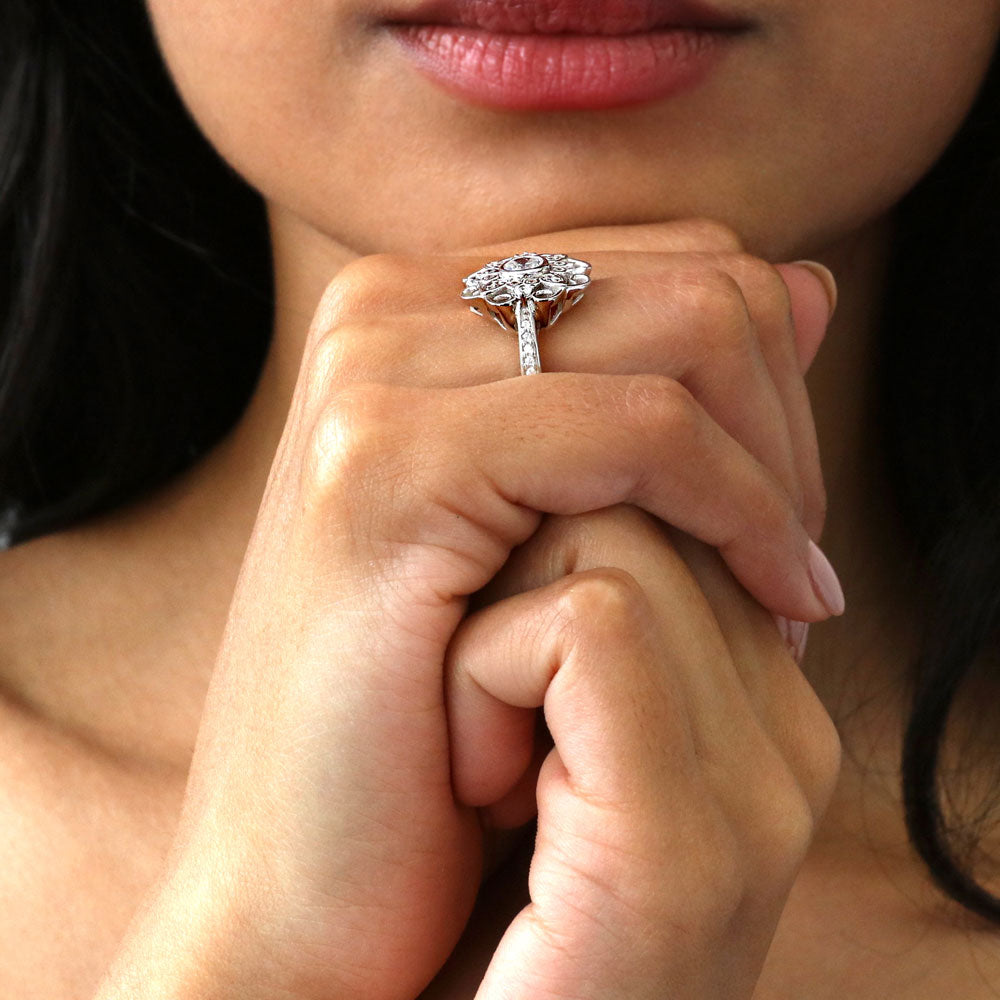 Model wearing Halo Flower Round CZ Ring in Sterling Silver, 7 of 9