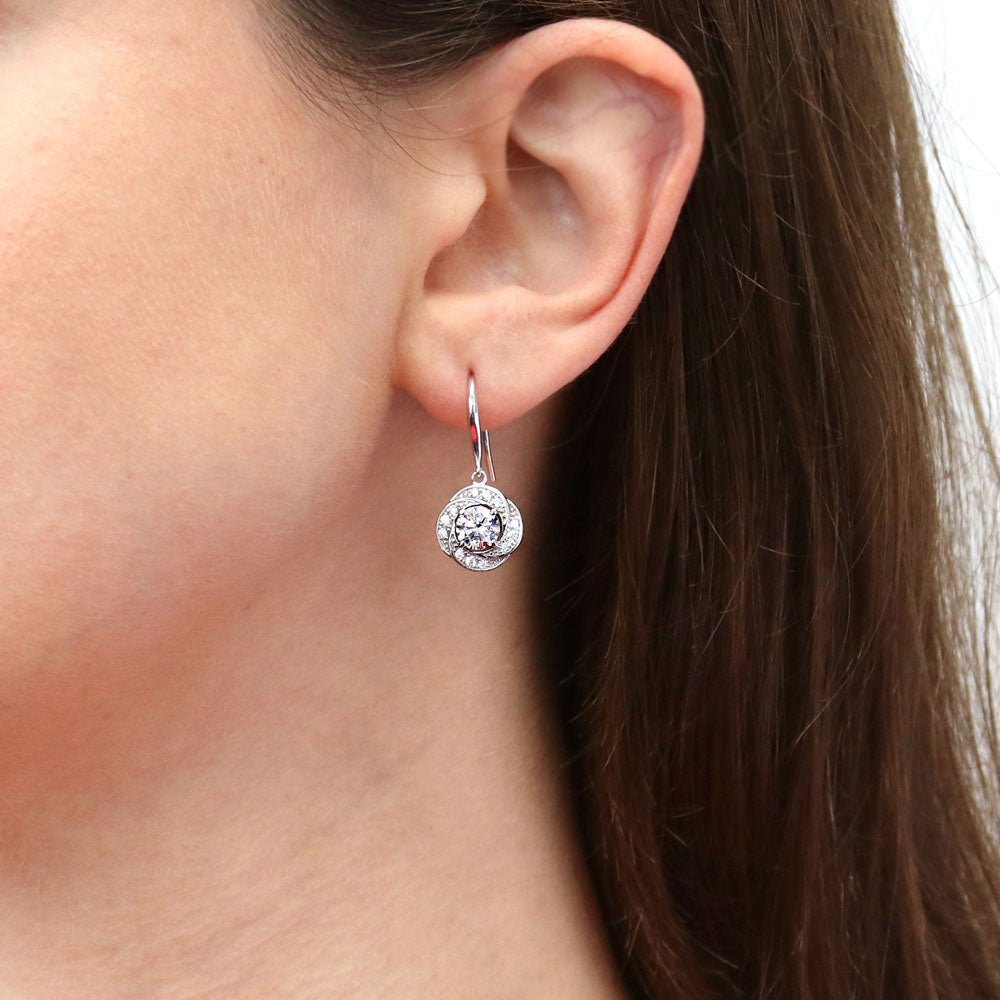 Model wearing Flower Woven CZ Fish Hook Dangle Earrings in Sterling Silver