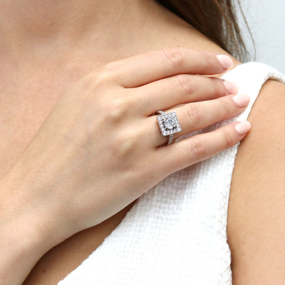 Model wearing Halo Round CZ Ring in Sterling Silver