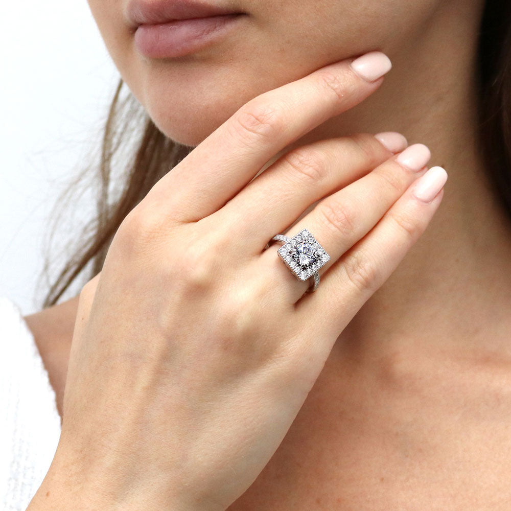 Model wearing Halo Round CZ Ring in Sterling Silver