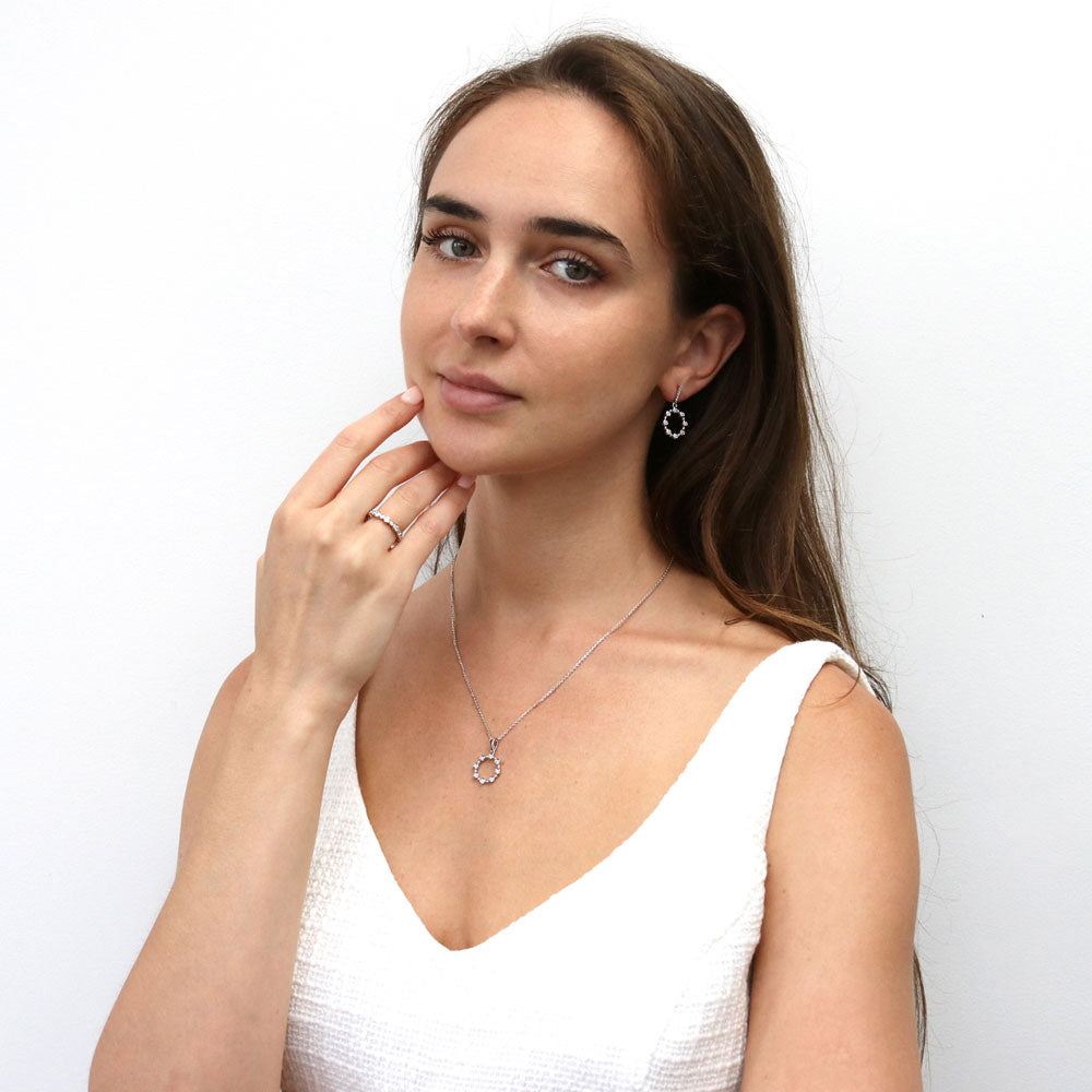 Model wearing Bubble Open Circle CZ Pendant Necklace in Sterling Silver