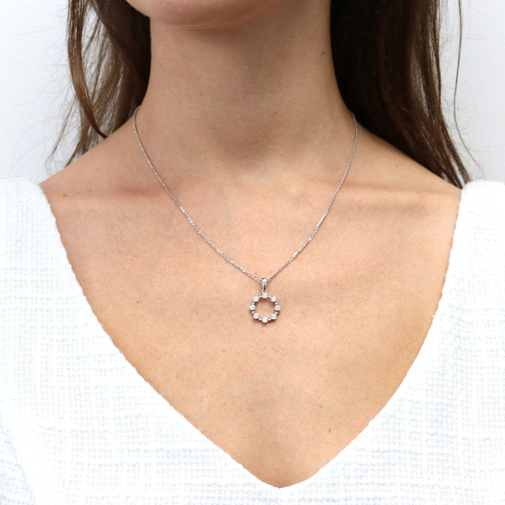 Model wearing Bubble Open Circle CZ Pendant Necklace in Sterling Silver, 2 of 9