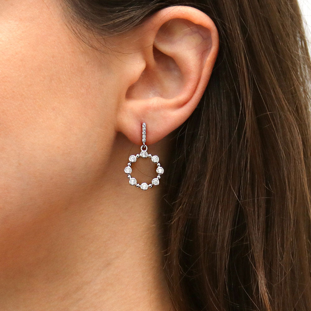 Model wearing Bubble Open Circle CZ Dangle Earrings in Sterling Silver