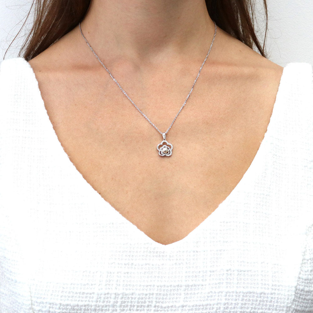 Model wearing Flower Imitation Pearl Pendant Necklace in Sterling Silver