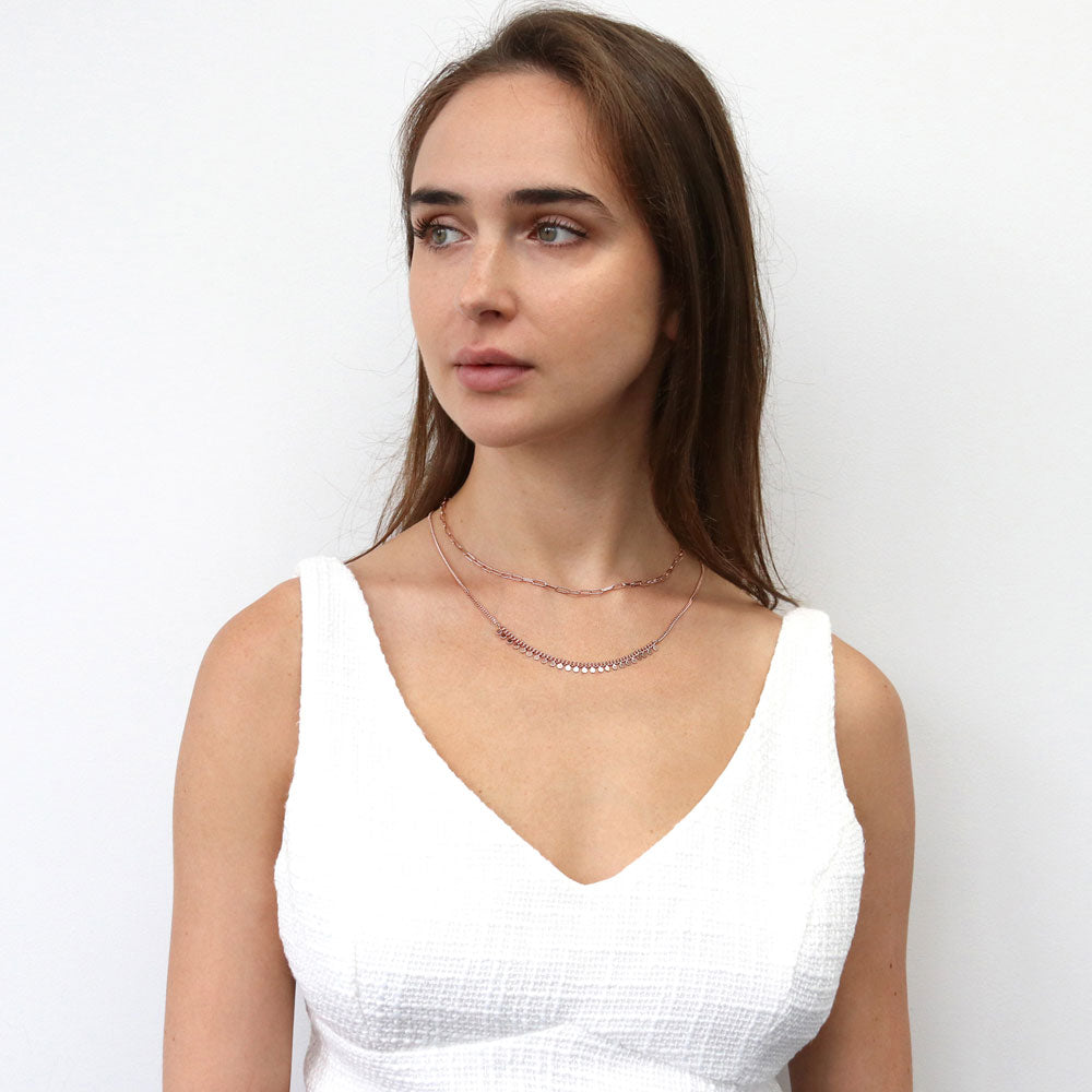 Model wearing Paperclip Disc Chain Necklace in Rose Gold Flashed Base Metal, 2 Piece