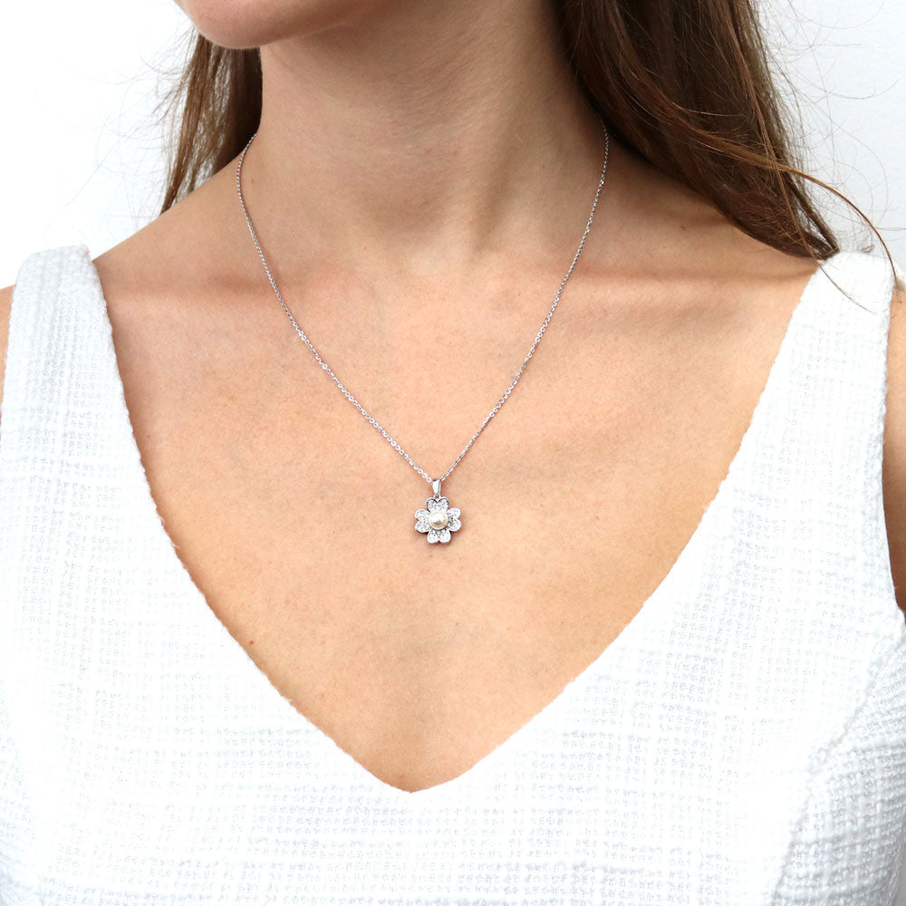 Model wearing Clover Imitation Pearl Pendant Necklace in Sterling Silver