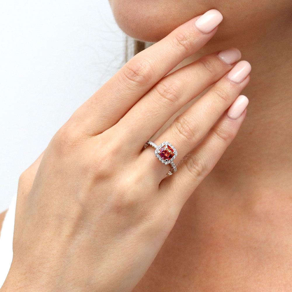 Model wearing Halo Kaleidoscope Red Orange Cushion CZ Ring in Sterling Silver