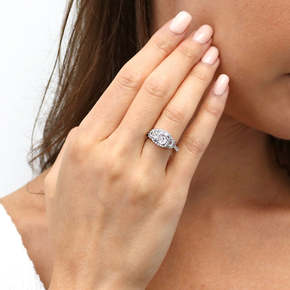 Model wearing 3-Stone Halo Cushion CZ Ring in Sterling Silver