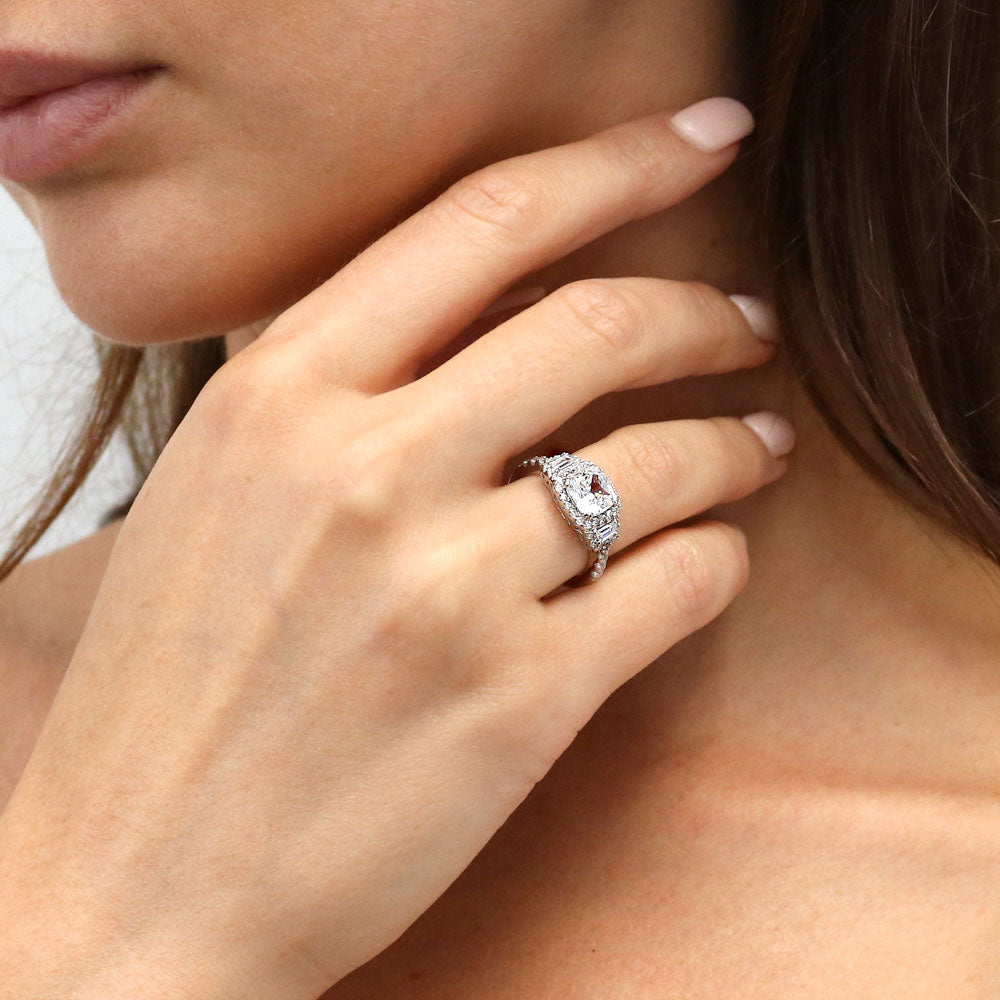 Model wearing 3-Stone Halo Cushion CZ Ring in Sterling Silver