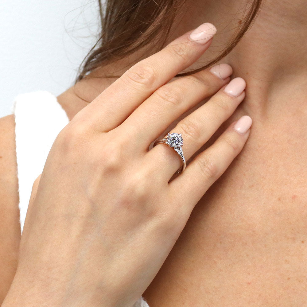 Model wearing Solitaire Flower 2ct Round CZ Ring in Sterling Silver, 2 of 9