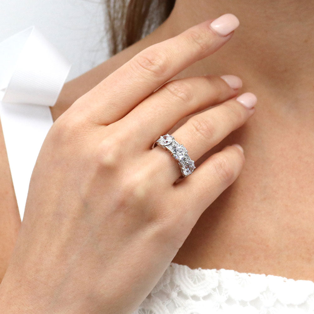 Model wearing 3-Stone Art Deco Round CZ Statement Ring in Sterling Silver