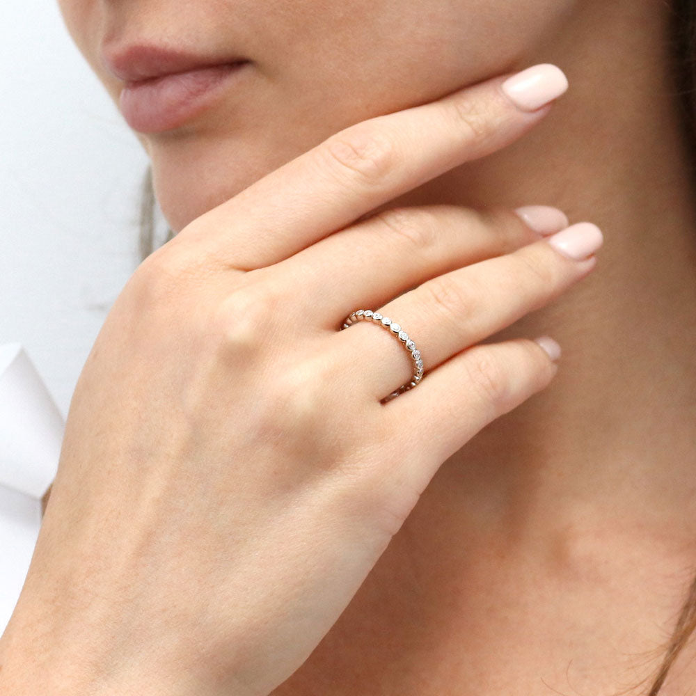 Model wearing Bubble Bezel Set CZ Eternity Ring in Sterling Silver