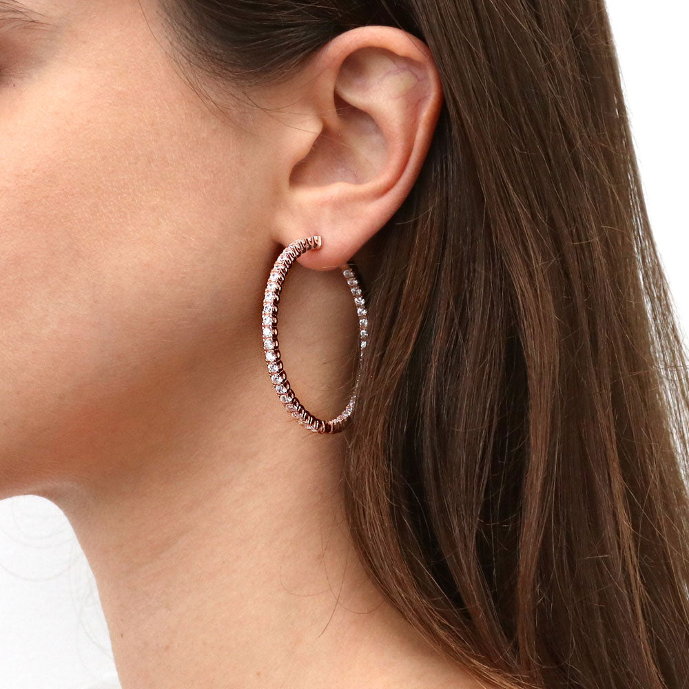 Model wearing CZ Large Inside-Out Hoop Earrings in Sterling Silver 1.9 inch