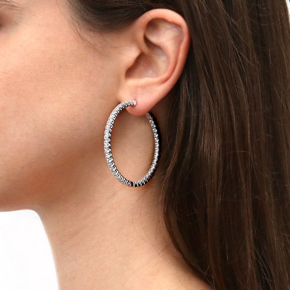 Model wearing CZ Large Inside-Out Hoop Earrings in Sterling Silver 1.9 inch