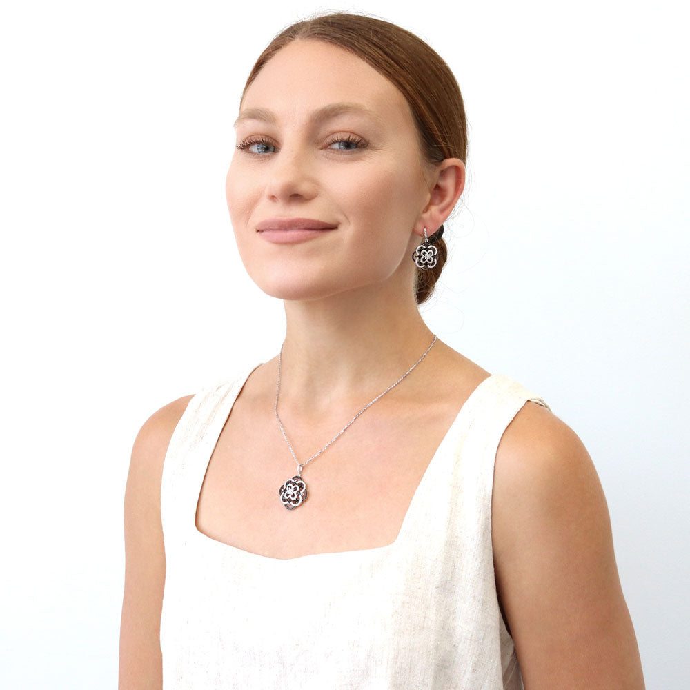 Model wearing Black and White Flower CZ Necklace and Earrings Set in Sterling Silver, 2 of 12