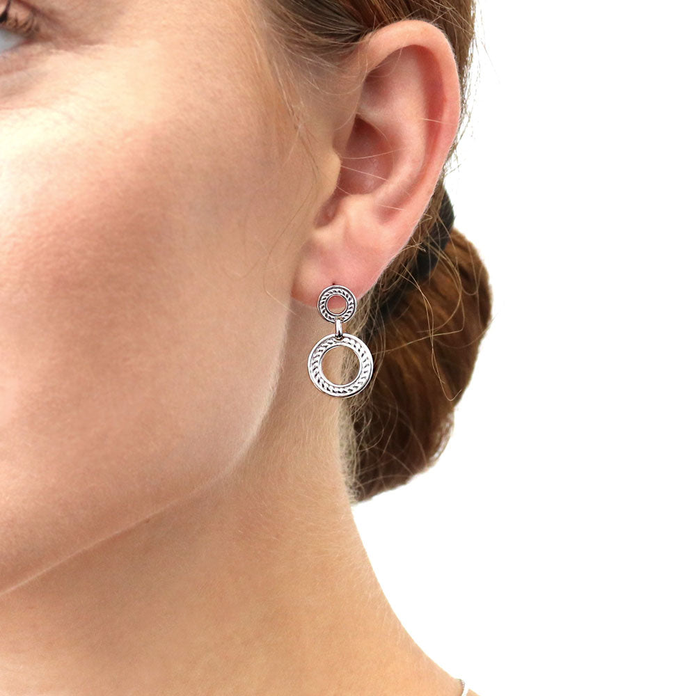 Model wearing Open Circle Cable Dangle Earrings in Sterling Silver