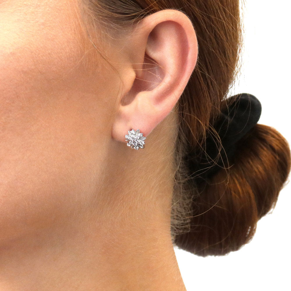 Model wearing Flower CZ Stud Earrings in Sterling Silver, 2 of 5