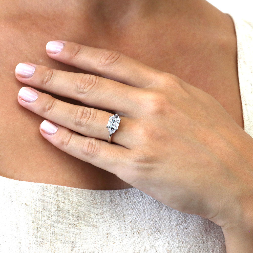 Model wearing 3-Stone Princess CZ Ring in Sterling Silver, 2 of 9