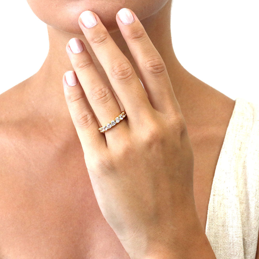Model wearing Pave Set CZ Eternity Ring in Gold Flashed Sterling Silver