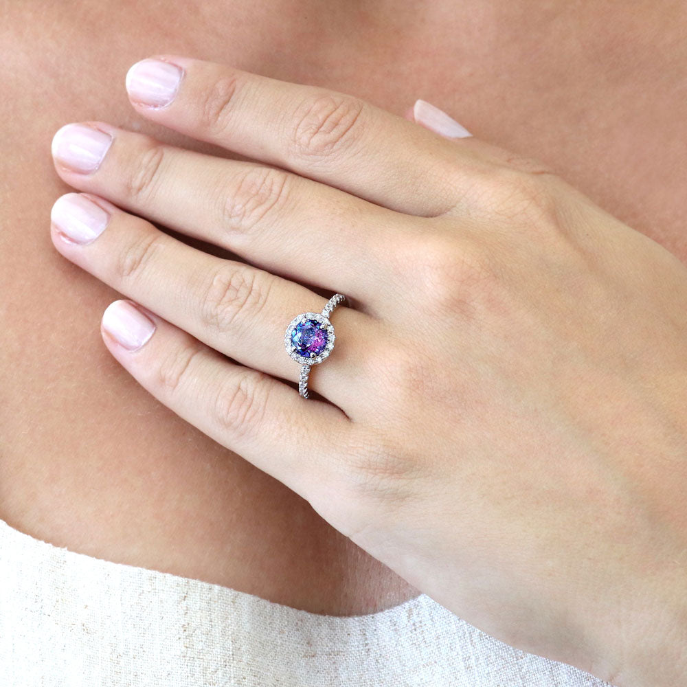 Model wearing Halo Kaleidoscope Purple Aqua Round CZ Ring in Sterling Silver
