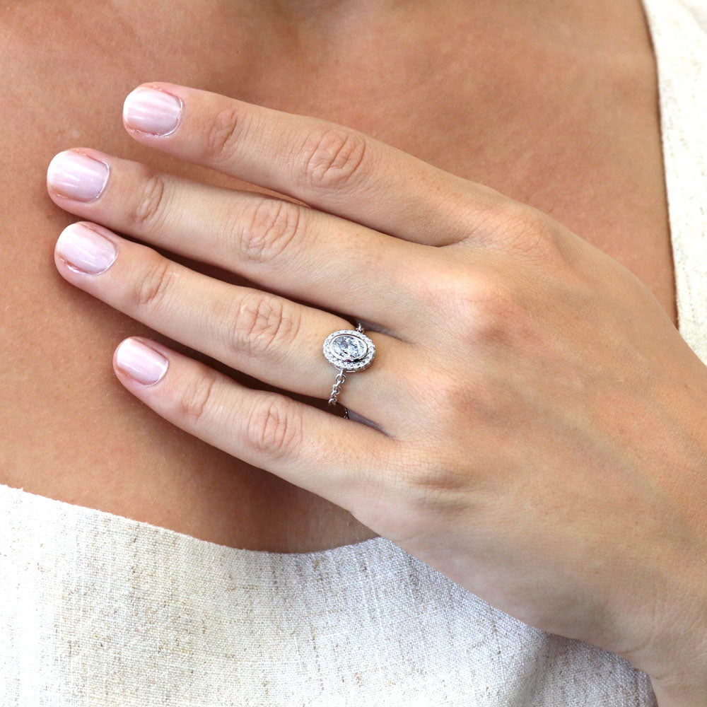 Model wearing Halo Oval CZ Chain Ring in Sterling Silver