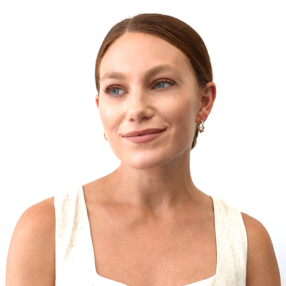 Model wearing Woven CZ Small Hoop Earrings in Sterling Silver 0.8 inch, Yellow Gold Flashed