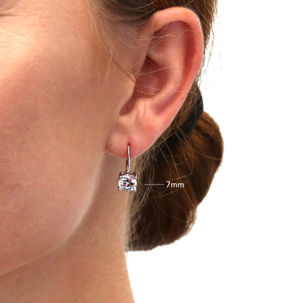 Model wearing Solitaire Round CZ Leverback Dangle Earrings in Sterling Silver