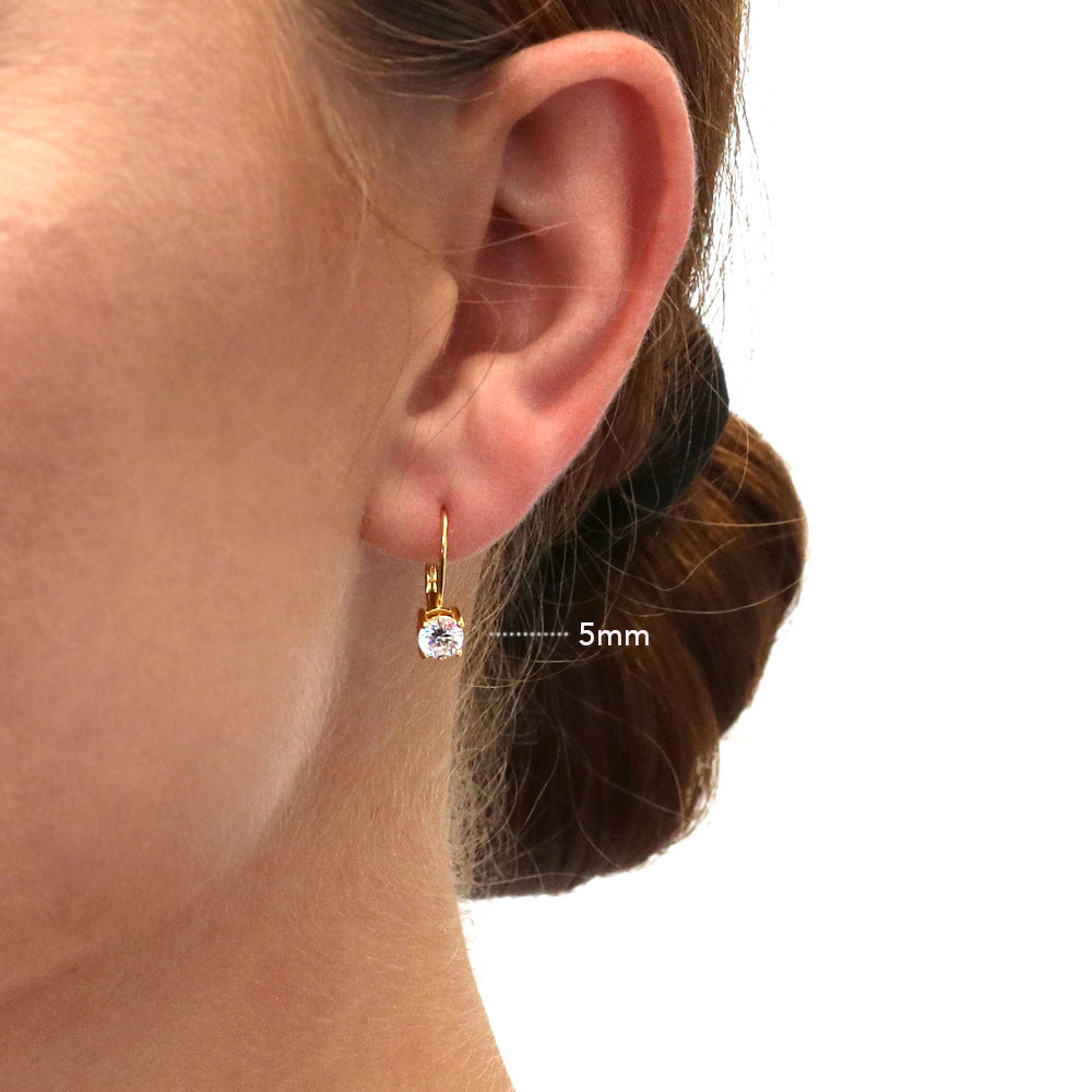 Model wearing Solitaire Round CZ Leverback Earrings in Gold Flashed Sterling Silver