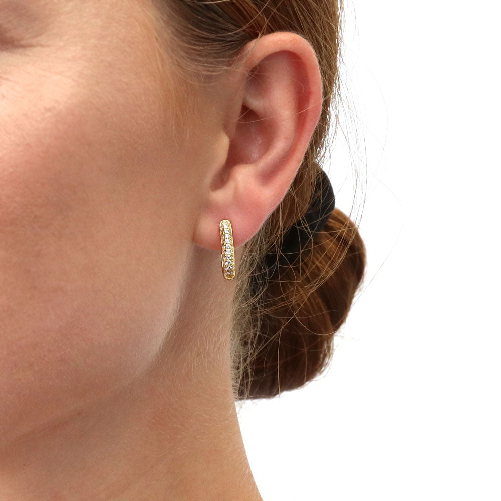 Model wearing Rectangle CZ Medium Hoop Earrings in Sterling Silver 0.62 inch