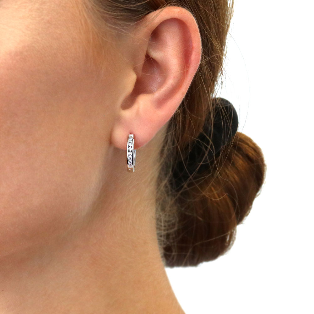 Model wearing Bar CZ Medium Hoop Earrings in Sterling Silver 0.64 inch