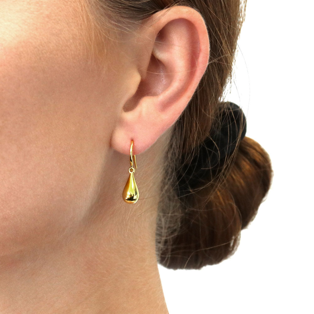Model wearing Teardrop Fish Hook Dangle Earrings in Sterling Silver