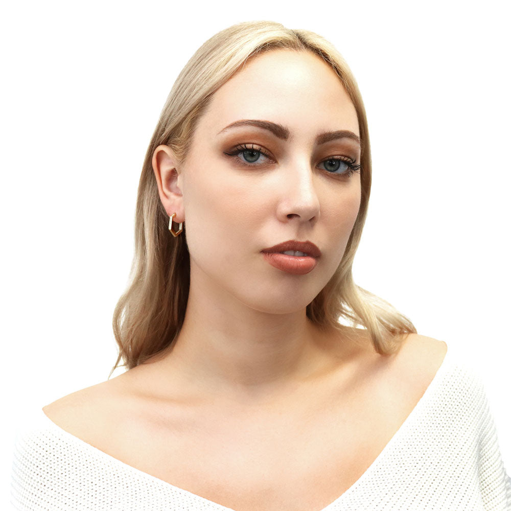 Model wearing Hexagon CZ Medium Inside-Out Hoop Earrings in Sterling Silver 0.8 inch