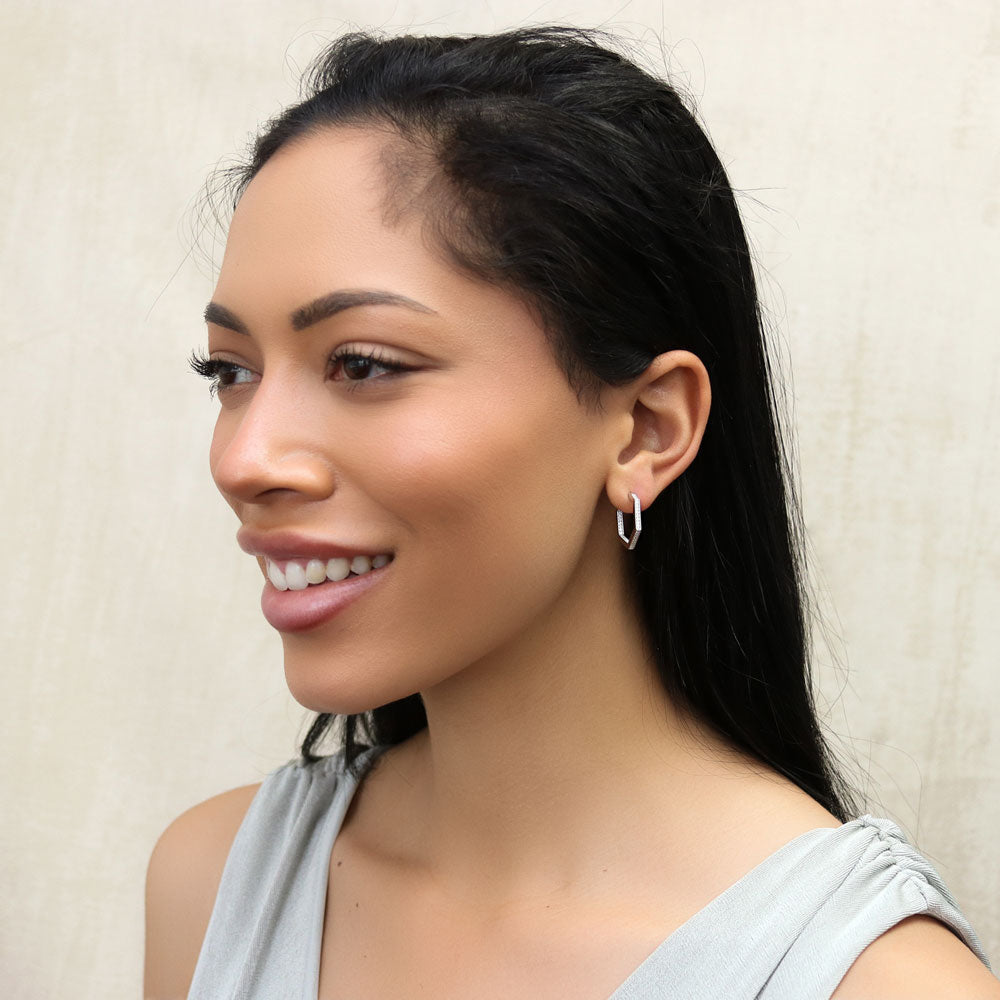 Model wearing Hexagon CZ Small Inside-Out Hoop Earrings in Sterling Silver 0.8 inch, Yellow Gold Flashed