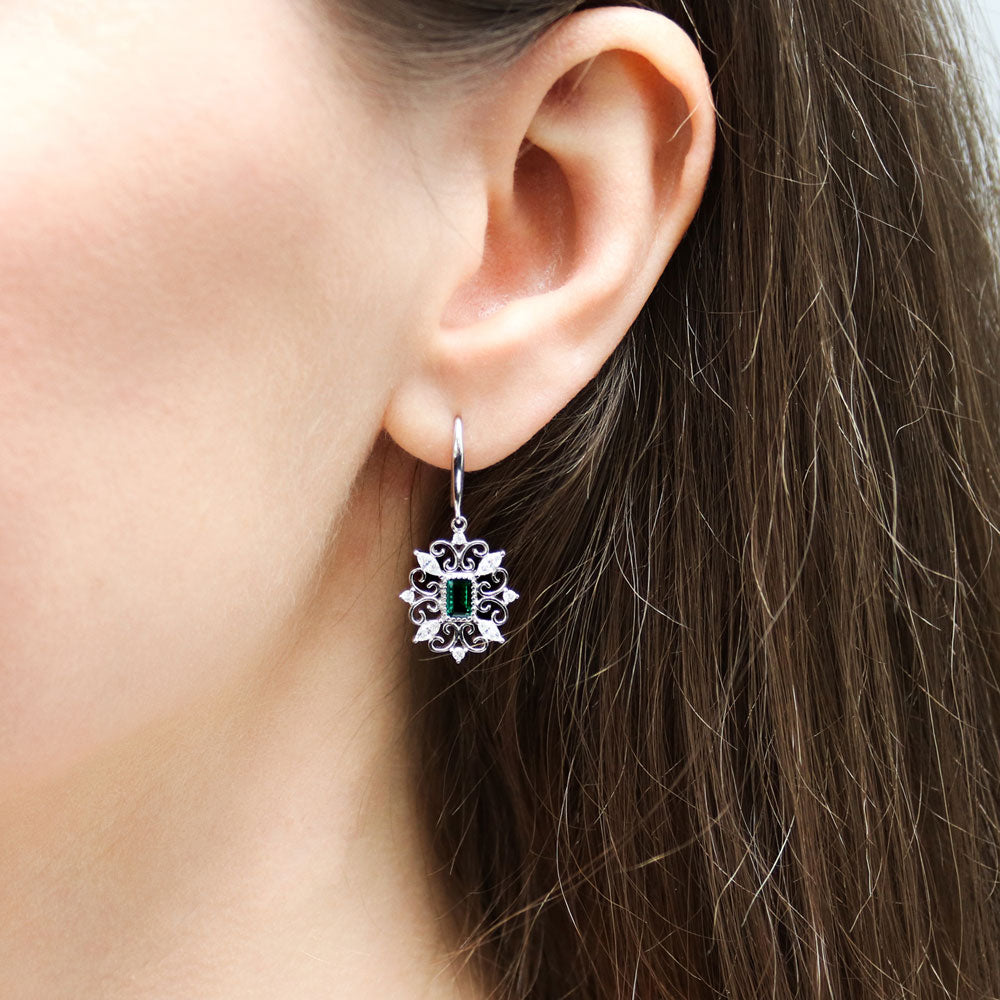 Model wearing Art Deco Filigree Green CZ Fish Hook Dangle Earrings in Sterling Silver