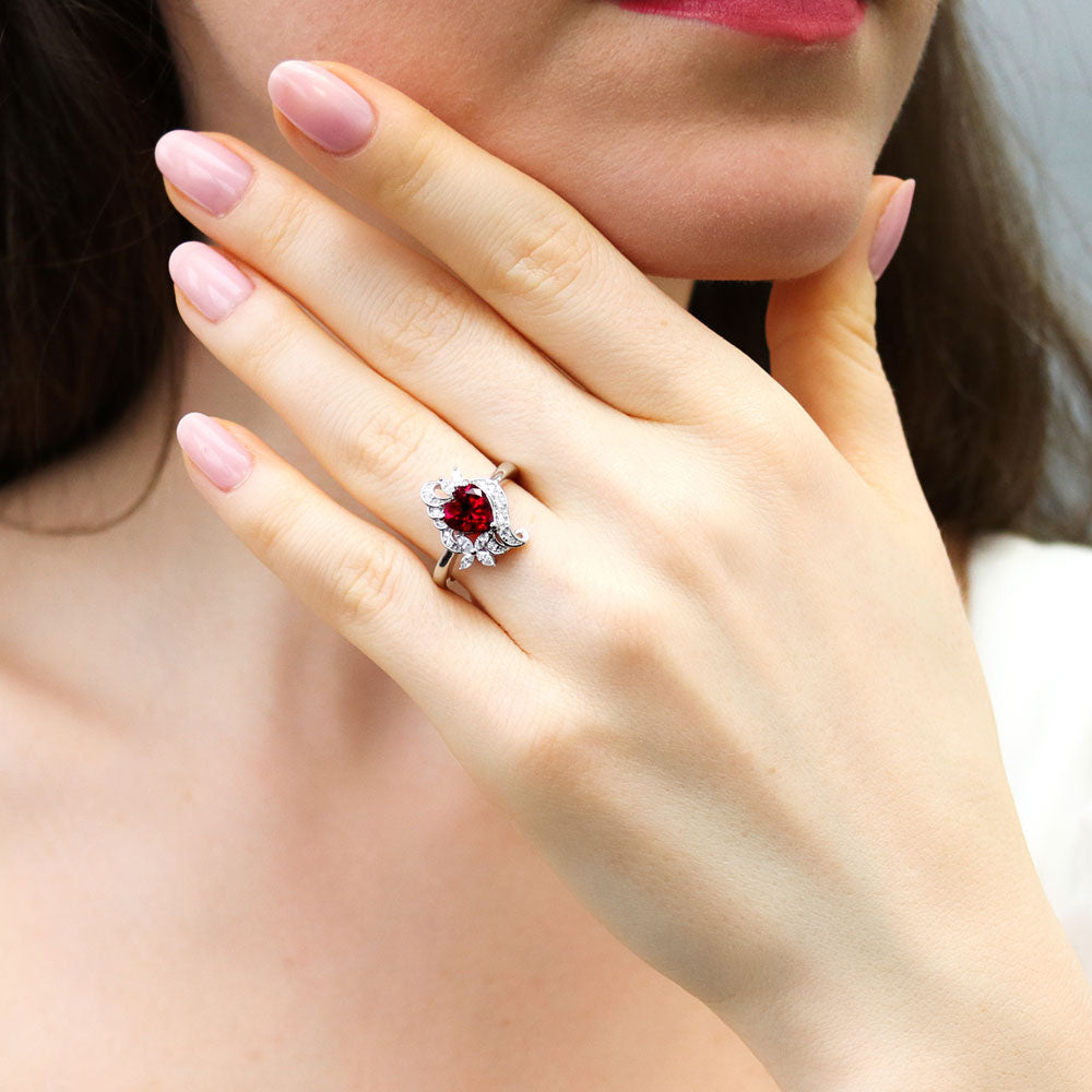 Model wearing Heart Flower Simulated Ruby CZ Ring in Sterling Silver