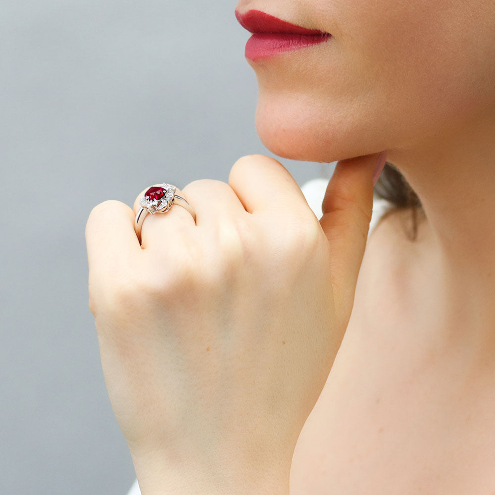 Model wearing Heart Flower Simulated Ruby CZ Ring in Sterling Silver