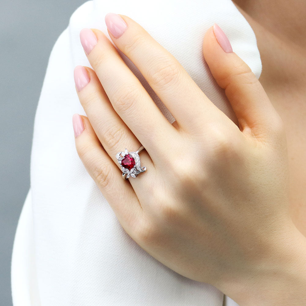 Model wearing Heart Flower Simulated Ruby CZ Ring in Sterling Silver