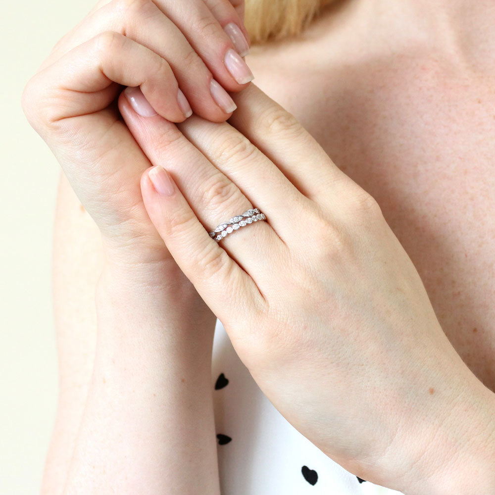 Model wearing Woven Bubble Pave Set CZ Eternity Ring Set in Sterling Silver